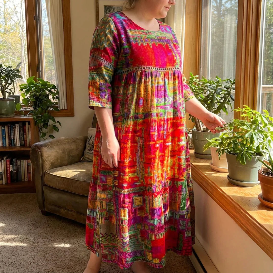 The Alina worn by a sunny window, three-quarter sleeves