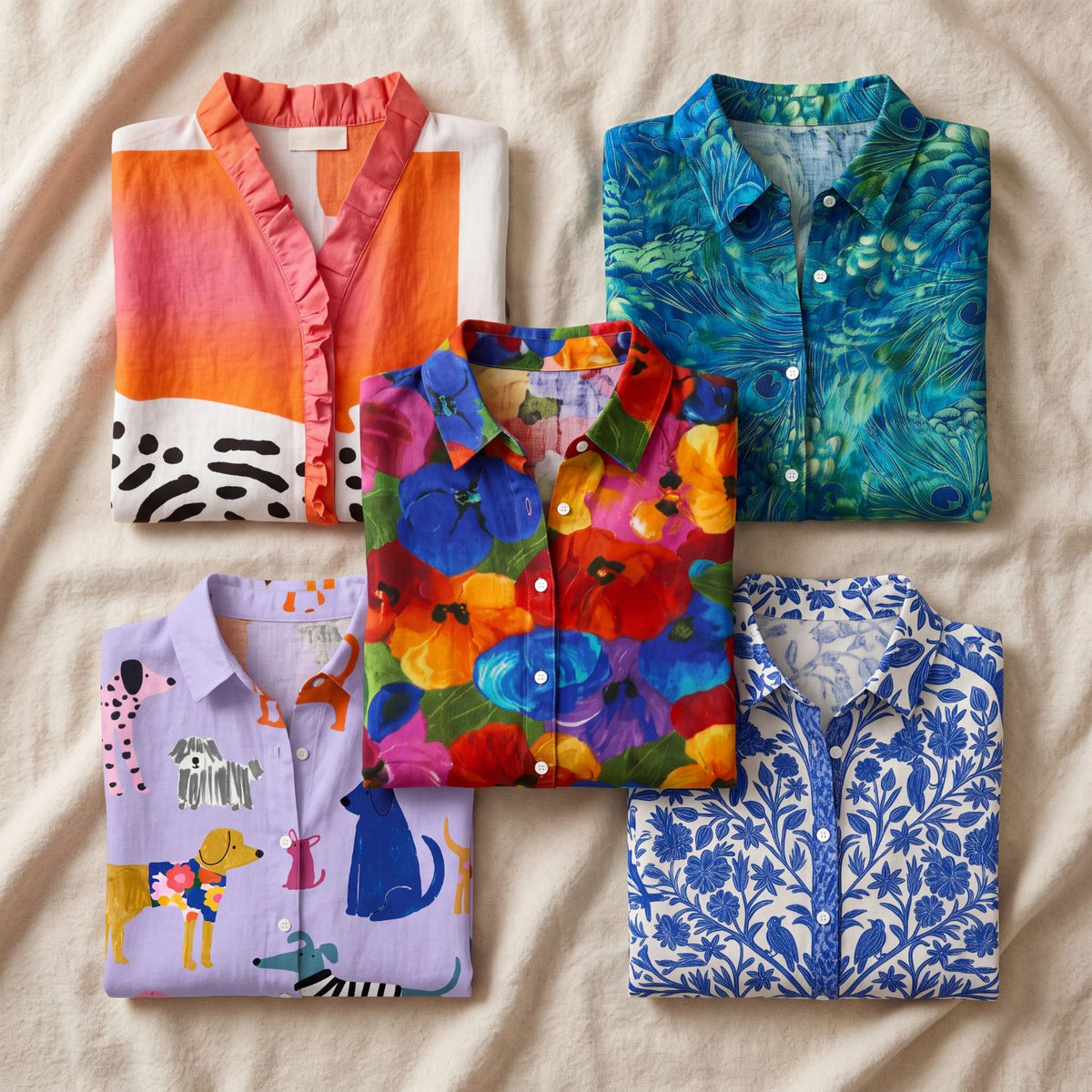 Five blouses from the Elegant Blouses collection folded on linen, the Florina top right