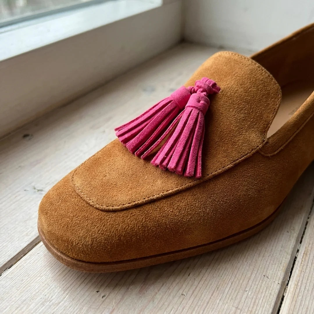 Close-up of the square toe and pink tassel of the Isadora loafer
