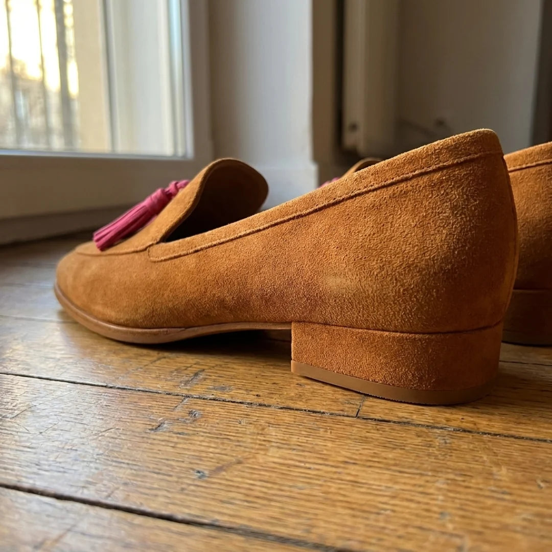 Close-up of the low block heel and sole of the Isadora loafer