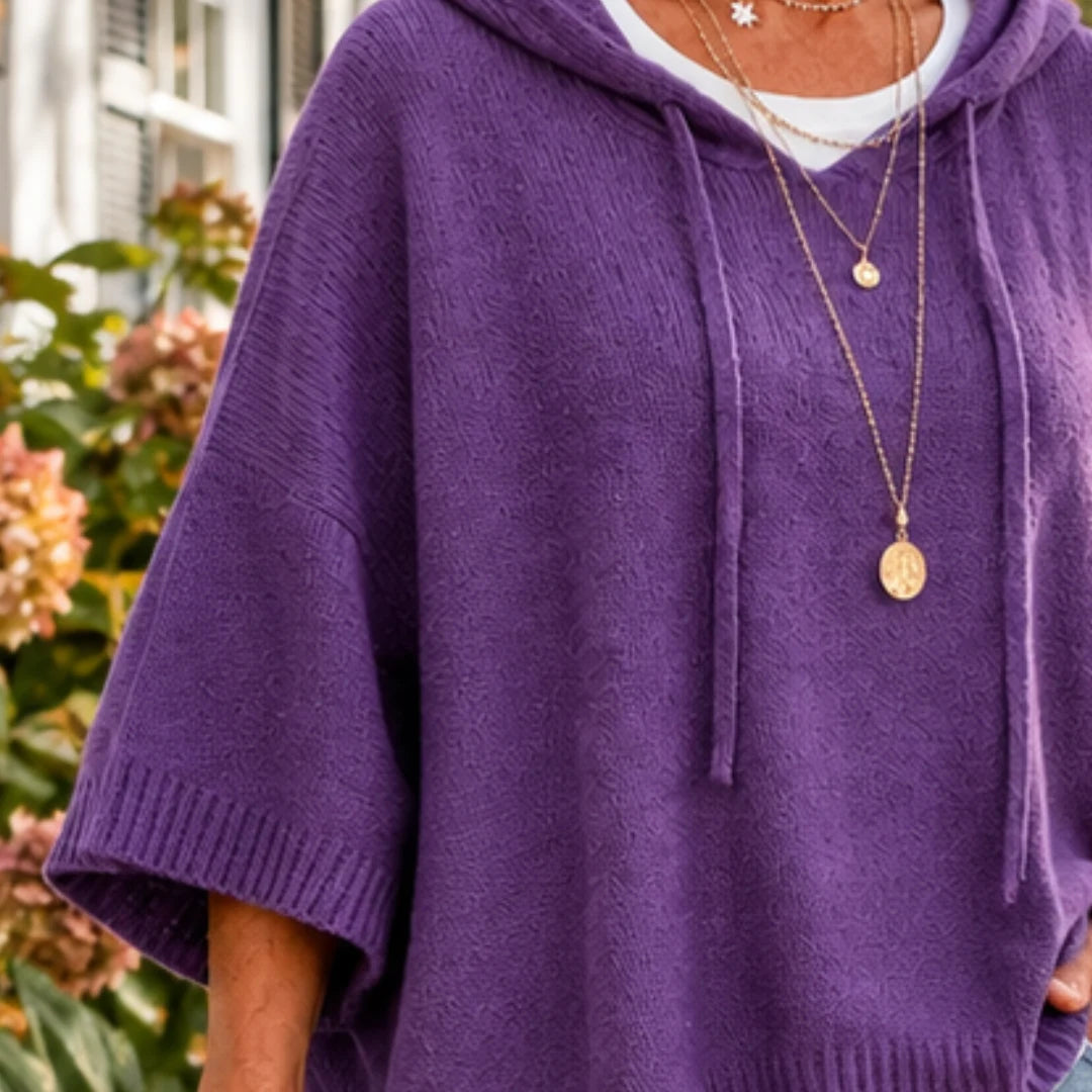 The purple poncho with jeans