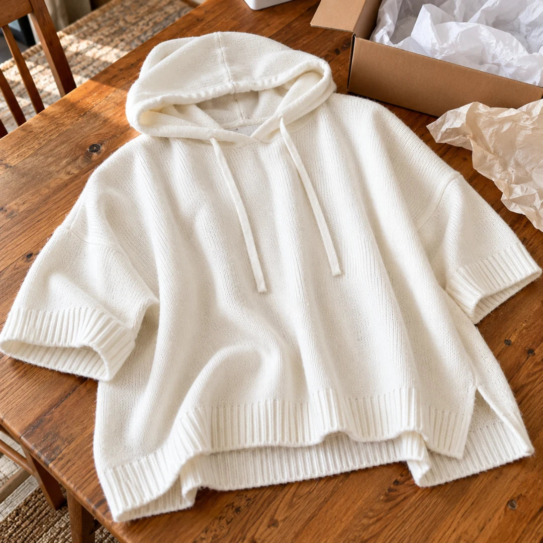 The white poncho laid out after unboxing