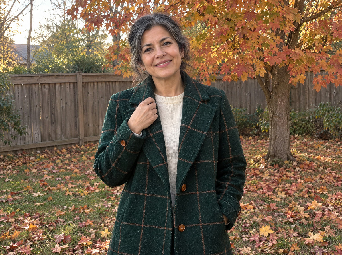 Customer wearing the Lauren checkered coat in her backyard